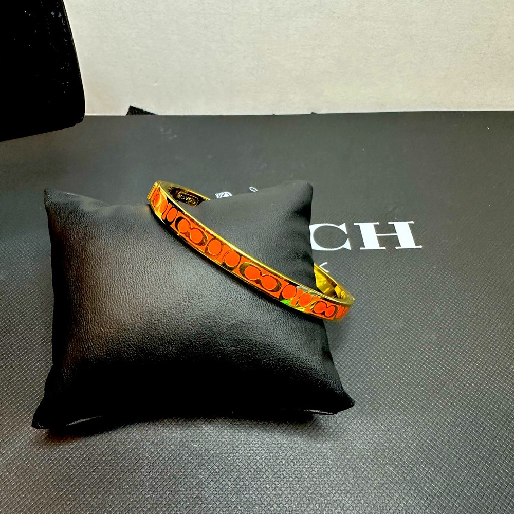 Coach Orange and Gold Bracelet